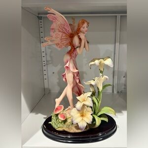 Elegant Fairy Figurine with Pink and Cream Accents